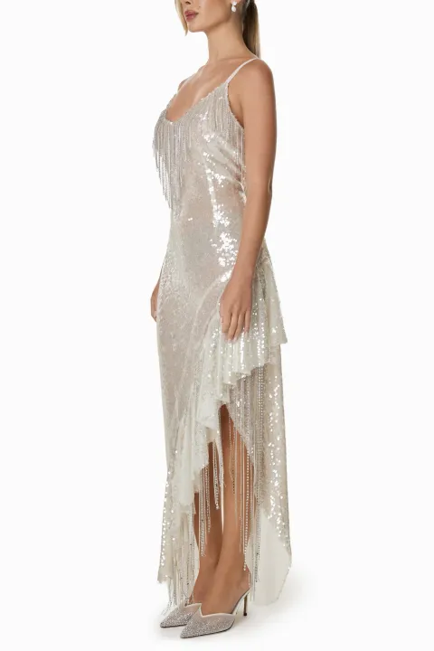 Asymmetric sparkly dress with beads and side draping
