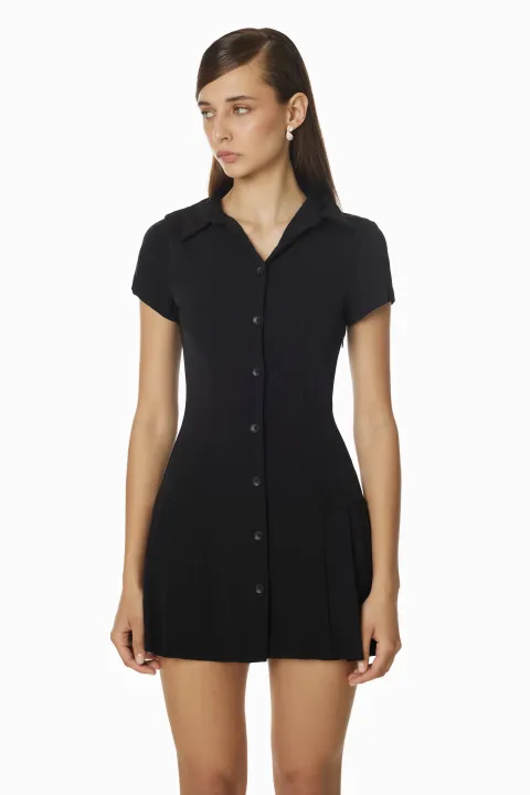 Black dress with pleated skirt
