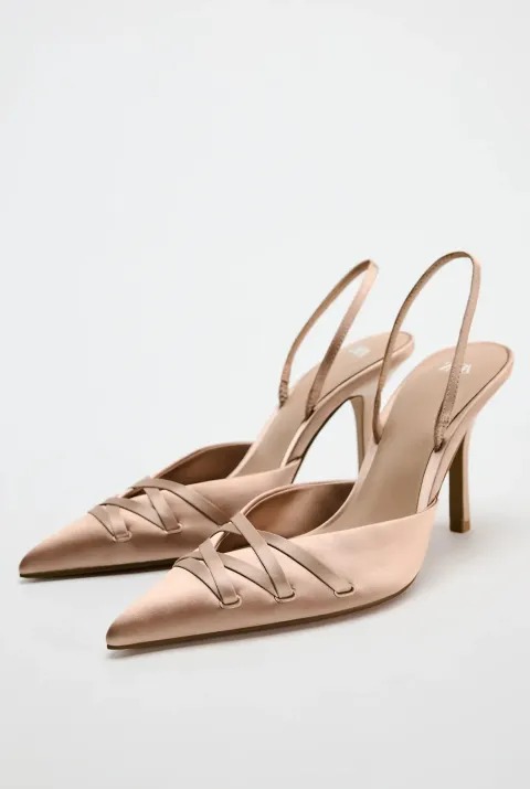 Rose gold pumps with ribbons