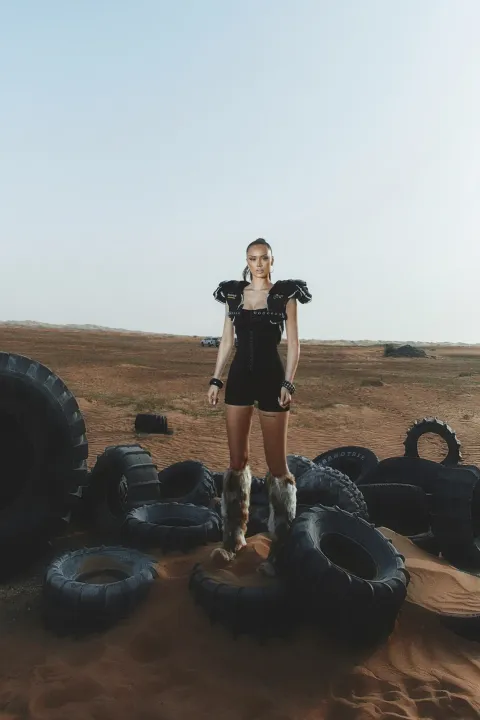 Jumpsuit with chest and waist fasteners