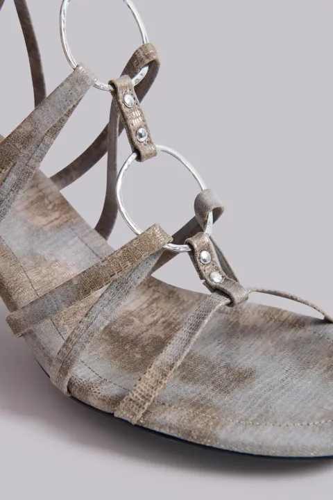 Knee-high strappy heels with metal ring detailing